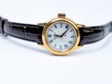 Đồng hồ nữ Tissot PVD vàng mặt trắng la mã dây da