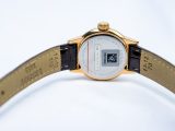 Đồng hồ nữ Tissot PVD vàng mặt trắng la mã dây da